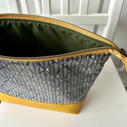 Grey leaves with mustard jumbo waterproof toiletry bag