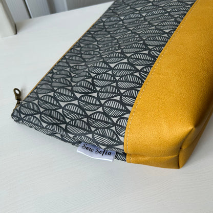 Grey leaves with mustard jumbo waterproof toiletry bag